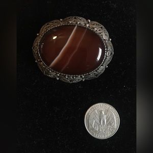 Vintage silver brooch!  Perfect to wear on clothes or as a purse accessory.